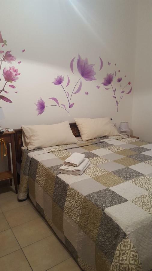 B&B Le Peonie Badesi Bagian luar foto